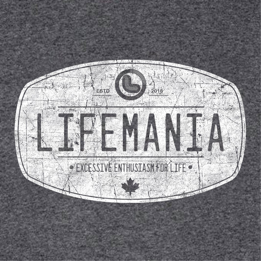 A white Lifemania vintage distressed oval design printed on a dark gray t-shirt front.